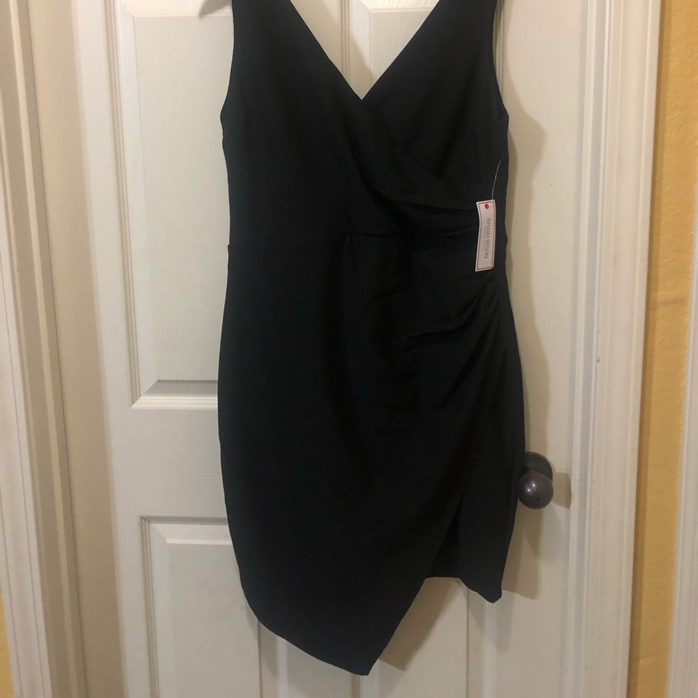 Black dress with gold zipper on back